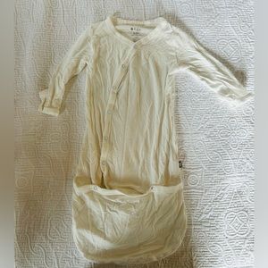 Kyte newborn footless pajamas. Cream. Size newborn.